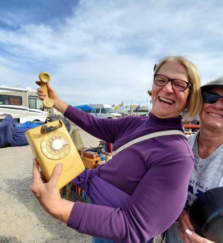 Gayle La Pointe shows off her Brown Bag Auction win.