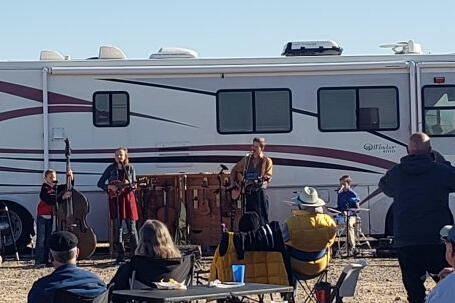 James and Amanda Balyeat and kids bless us with their music.